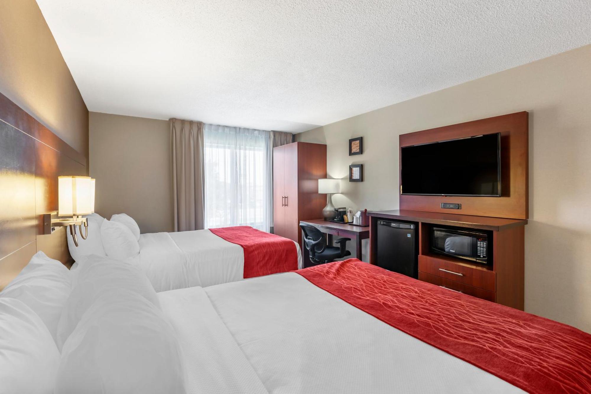 Quadruple Room Two Queen Beds Non Smoking or Upper floor